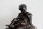 Flämischer Bildhauer des 17./18. Jhd. - Sitzender Putto mit Blüte - um 1700 - Bronzehohlguss, braun patiniert